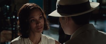 Movie still from “Live by Night” (2016), directed by Ben Affleck – A man and a woman talking to each other; Close Up shot, Over the shoulder angle