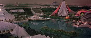 Movie still from “Logan's Run” (1976), directed by Michael Anderson – An aerial view of an artificial lake with boats floating on it; Extreme Wide shot, High angle
