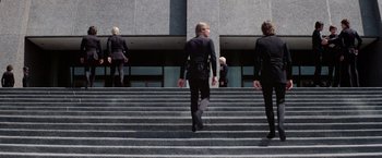 Movie still from “Logan's Run” (1976), directed by Michael Anderson – A group of people walking up some stairs; Wide shot, Low angle