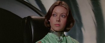 Movie still from “Logan's Run” (1976), directed by Michael Anderson – A person wearing a collar; Close Up shot, Low angle