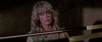 Movie still from “Logan's Run” (1976), directed by Michael Anderson – A woman crying with her eyes closed; Close Up shot, Low angle