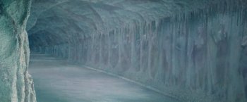 Movie still from “Logan's Run” (1976), directed by Michael Anderson – A wall of ice is shown in the middle of a road; Extreme Wide shot, High angle