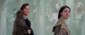 Movie still from “Logan's Run” (1976), directed by Michael Anderson – Two women are standing in front of a mirror; Medium shot, Low angle