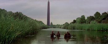 Movie still from “Logan's Run” (1976), directed by Michael Anderson – A group of people swimming in a body of water; Extreme Wide shot, Low angle