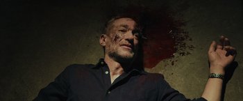 A person with blood on his face