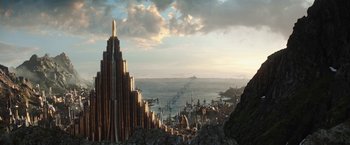 Movie still from “Loki” (2021), created by Michael Waldron – An image of a city with a view of the ocean; Extreme Wide shot, High angle