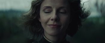 Movie still from “Loki” (2021), created by Michael Waldron – A person with closed eyes; Close Up shot, Low angle