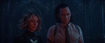 Movie still from “Loki” (2021), created by Michael Waldron – A man and a woman standing next to each other; Close Up shot, Low angle