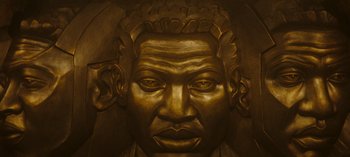 Movie still from “Loki” (2021), created by Michael Waldron – The face of an african - american man; Extreme Close Up shot, Overhead angle