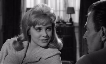 Movie still from “Lolita” (1962), directed by Stanley Kubrick – A black and white photo of a woman in a room; Close Up shot, Over the shoulder angle