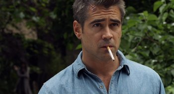 Movie still from “London Boulevard” (2010), directed by William Monahan – A person with a cigarette in his mouth; Close Up shot, Over the shoulder angle