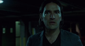 Movie still from “London Boulevard” (2010), directed by William Monahan – A person wearing a jacket; Close Up shot, Low angle