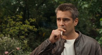 Movie still from “London Boulevard” (2010), directed by William Monahan – A person smoking a cigarette; Close Up shot, Over the shoulder angle
