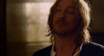 Movie still from “London Boulevard” (2010), directed by William Monahan – A person with long hair; Close Up shot, Over the shoulder angle