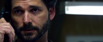 Movie still from “Lone Survivor” (2013), directed by Peter Berg – A person with a beard; Close Up shot, Over the shoulder angle