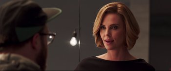 Movie still from “Long Shot” (2019), directed by Jonathan Levine – Charlize theron in a scene from the movie a million little things; Close Up shot, Over the shoulder angle