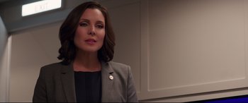 Movie still from “Long Shot” (2019), directed by Jonathan Levine – A person wearing a suit and tie; Close Up shot, Low angle