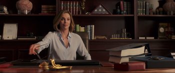 Movie still from “Long Shot” (2019), directed by Jonathan Levine – A woman sitting at a desk in front of a computer; Medium shot, Low angle