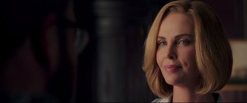 Movie still from “Long Shot” (2019), directed by Jonathan Levine – A person with blonde hair; Close Up shot, Over the shoulder angle