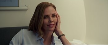 Movie still from “Long Shot” (2019), directed by Jonathan Levine – A person with a hand on her head; Close Up shot, Over the shoulder angle