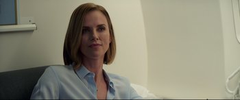 Movie still from “Long Shot” (2019), directed by Jonathan Levine – A person sitting in a room; Close Up shot, Over the shoulder angle