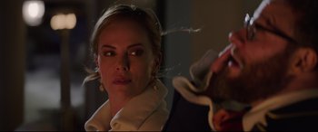 Movie still from “Long Shot” (2019), directed by Jonathan Levine – A person wearing a jacket; Close Up shot, Over the shoulder angle