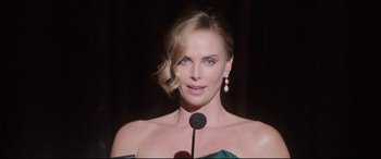 Movie still from “Long Shot” (2019), directed by Jonathan Levine – Charlize theron at the 2 0 1 2 oscars; Close Up shot, Over the shoulder angle