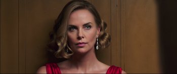 Movie still from “Long Shot” (2019), directed by Jonathan Levine – A person wearing a red dress; Close Up shot, Low angle