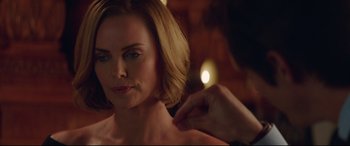 Movie still from “Long Shot” (2019), directed by Jonathan Levine – A person cutting a woman's hair; Close Up shot, Over the shoulder angle