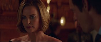 Movie still from “Long Shot” (2019), directed by Jonathan Levine – A person with short blonde hair; Close Up shot, Over the shoulder angle