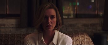 Movie still from “Long Shot” (2019), directed by Jonathan Levine – A person wearing a white shirt; Close Up shot, Over the shoulder angle