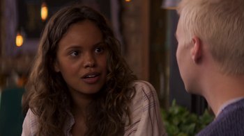 Movie still from “13 Reasons Why” (2017), created by Brian Yorkey – A young woman talking to a young man; Close Up shot, Over the shoulder angle