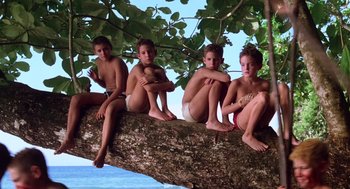 Movie still from “Lord of the Flies” (1990), directed by Harry Hook – A group of kids sitting on top of a tree branch; Wide shot, Low angle