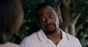 Movie still from “Love & Basketball” (2000), directed by Gina Prince-Bythewood – A person with his eyes wide open; Close Up shot, Over the shoulder angle