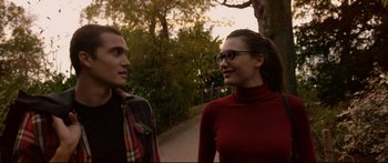 Movie still from “Love” (2015), directed by Gaspar Noé – A man and a woman are talking to each other; Medium shot, Over the shoulder angle