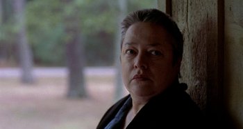 Movie still from “Love Liza” (2002), directed by Todd Louiso – A person with short hair; Close Up shot, Over the shoulder angle