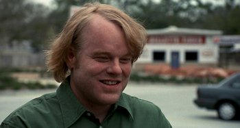 Movie still from “Love Liza” (2002), directed by Todd Louiso – A person with long blonde hair; Close Up shot, Over the shoulder angle