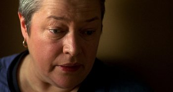 Movie still from “Love Liza” (2002), directed by Todd Louiso – A person looking at the camera; Close Up shot, High angle