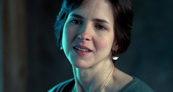 Movie still from “Love Liza” (2002), directed by Todd Louiso – A person with short hair; Close Up shot, Over the shoulder angle