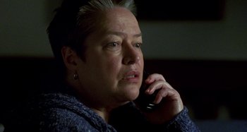 Movie still from “Love Liza” (2002), directed by Todd Louiso – An older woman talking on a cell phone; Close Up shot, High angle