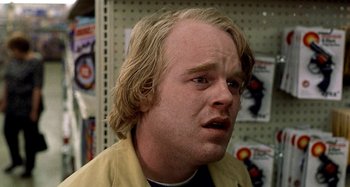 Movie still from “Love Liza” (2002), directed by Todd Louiso – A person with long blonde hair; Close Up shot, Low angle