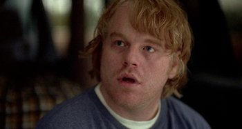 Movie still from “Love Liza” (2002), directed by Todd Louiso – A person with long blonde hair; Close Up shot, Over the shoulder angle
