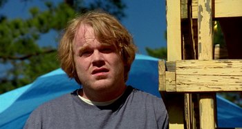 Movie still from “Love Liza” (2002), directed by Todd Louiso – A person wearing a t - shirt; Close Up shot, Low angle