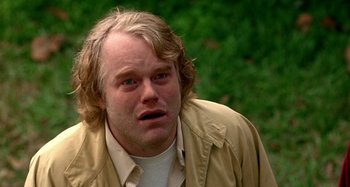 Movie still from “Love Liza” (2002), directed by Todd Louiso – A person with long hair; Close Up shot, Over the shoulder angle