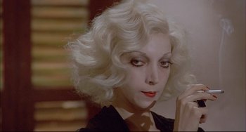 A person wearing a white wig