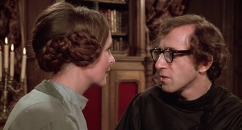 Movie still from “Love and Death” (1975), directed by Woody Allen – A man and a woman talking to each other; Close Up shot, Over the shoulder angle