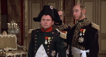 Movie still from “Love and Death” (1975), directed by Woody Allen – A man in a military uniform with a hat on; Medium shot, Low angle