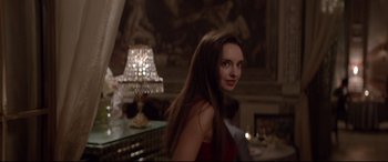 Movie still from “Loveless” (2017), directed by Andrey Zvyagintsev – A beautiful young lady standing in front of a lamp; Medium shot, Over the shoulder angle