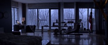 Movie still from “Loveless” (2017), directed by Andrey Zvyagintsev – A living room filled with furniture and large windows; Wide shot, High angle