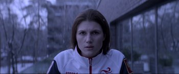 Movie still from “Loveless” (2017), directed by Andrey Zvyagintsev – A person wearing a jacket; Close Up shot, Low angle